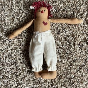 Primitive handmade rag doll with patched on heart